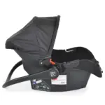 Moni Multi Isize auto sedište za bebe 40-87 cm - Beige prikaz sa bočne strane sa spuštenom ručkom